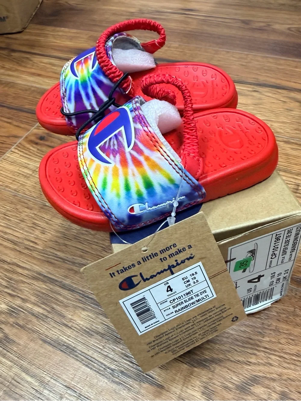 Champion Kids Red Slides with Rainbow Tie-Dye Straps and Logo